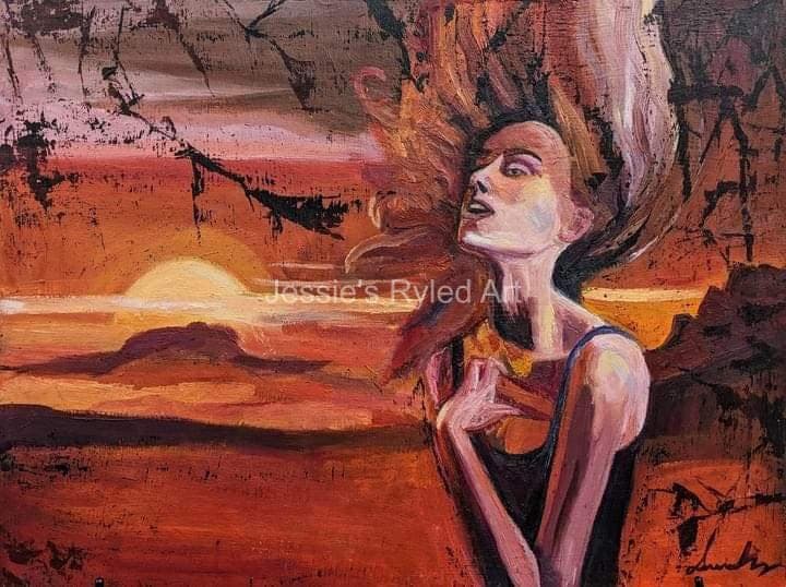 A woman in profile with windblown hair looks up at a red and orange sunset over dark land.
